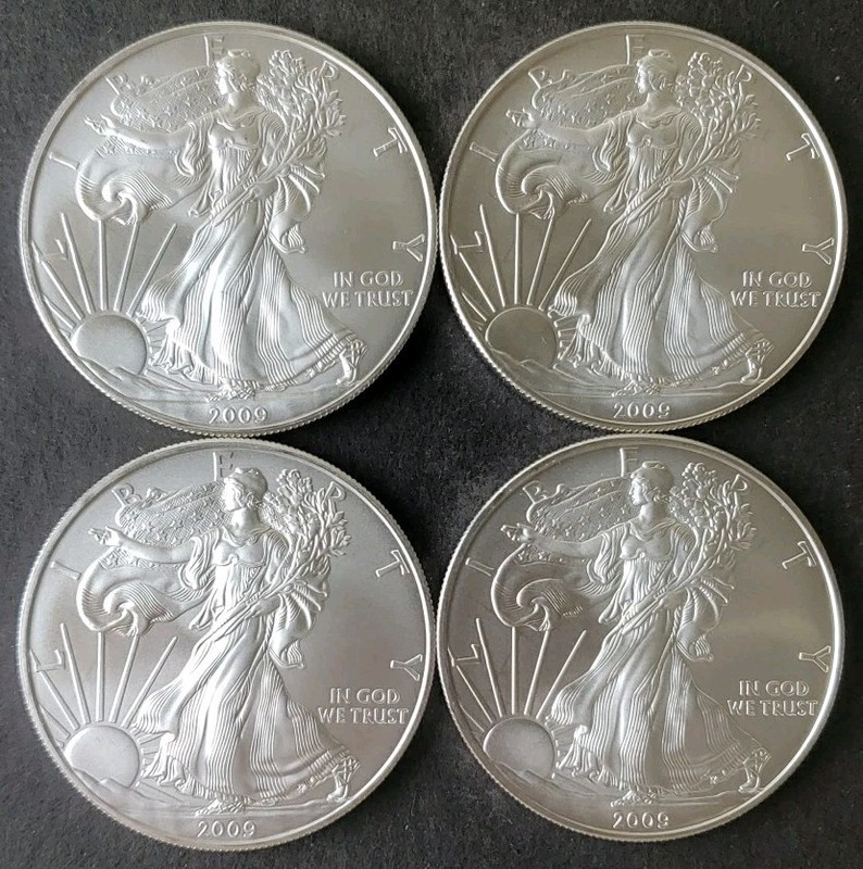 Lot of Four 2009 $1 American Silver Eagle Dollars