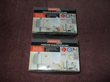 Zwei Fenster-Zusatzschlösser, original verpackt