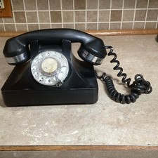 Vintage rotary phone know as a "Frankenphone" With Chrome Trim