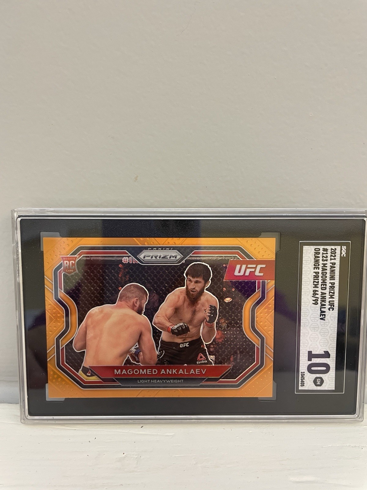 2021 Panini Prizm UFC - Magomed Ankalaev #123 Orange Prizm /99 (RC)
