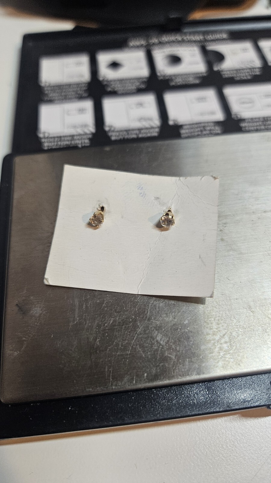 gold stud earrings - image 1
