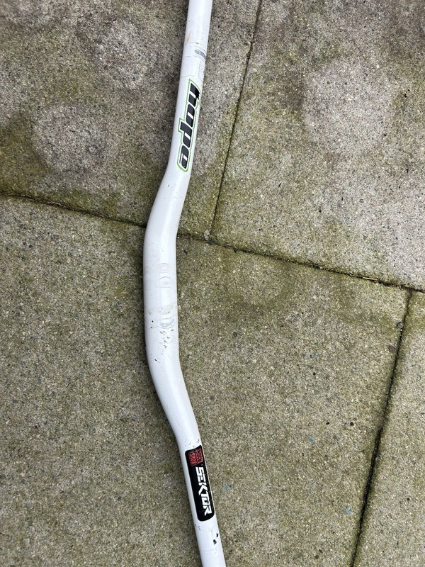 white aluminum mountain bike riser handlebar