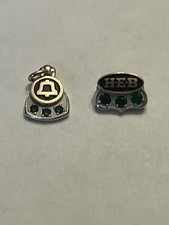 The Chesapeake & Potomac Telephone Co 10k gold pendant and 10k gold HEB pin