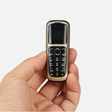 Unlocked Smallest V2 Supper Mini GSM Cell Mobile Diale Phones Keyboard phone