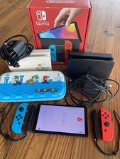 Nintendo Switch OLED with 128 GB SD Card, Carry Case, Extra Dock And Charger