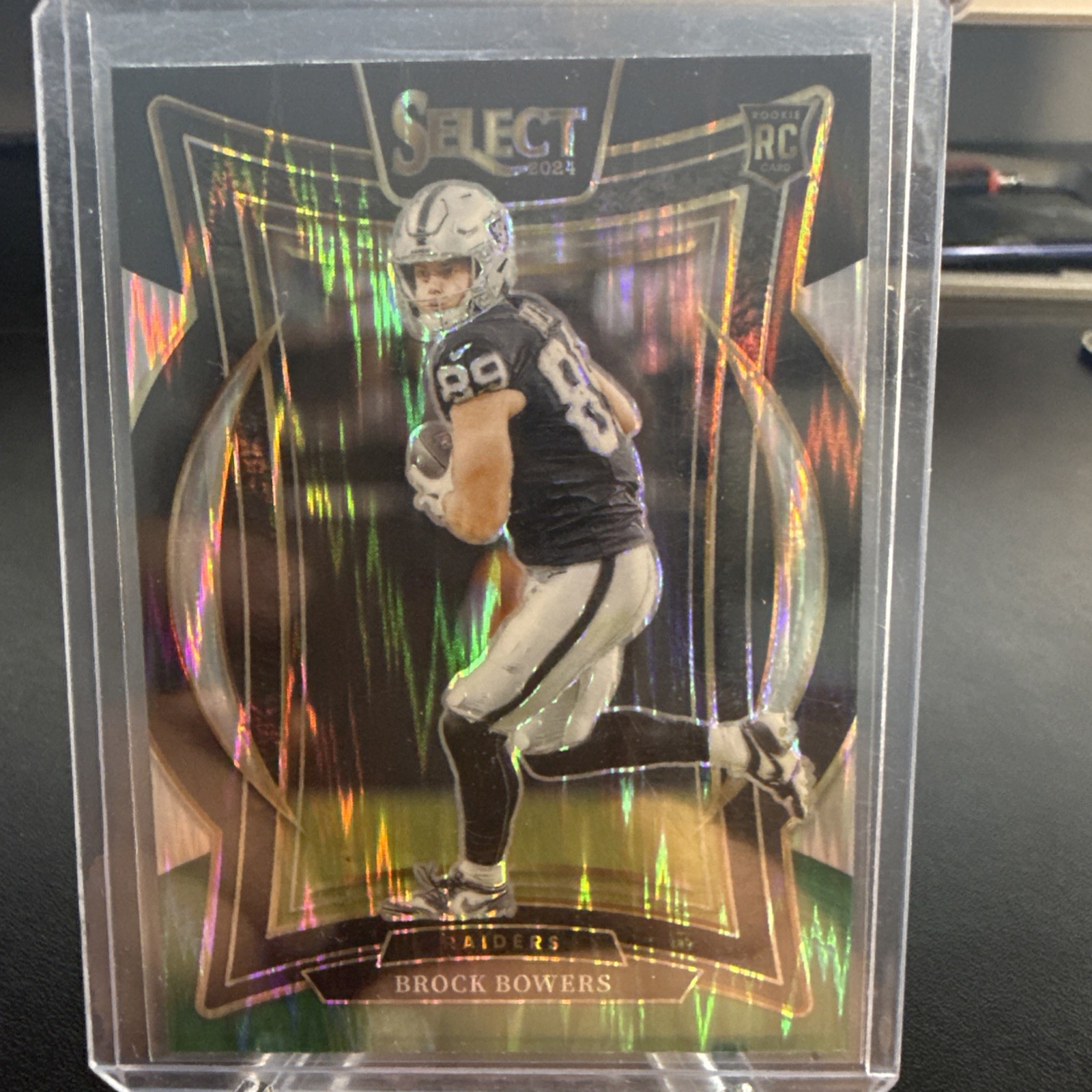 2024 Panini Select - Concourse Brock Bowers #31 Black & Green Shock Prizm (RC)