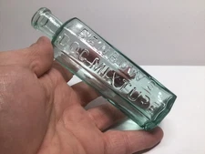 Antique Benbow’s Dog Mixture Homeopathic Medicine Bottle.