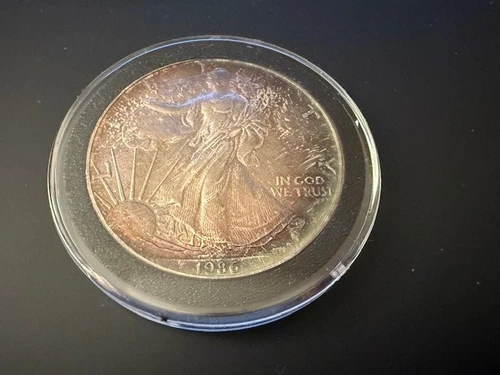 1986 WALKING LIBERTY AMERICAN EAGLE .999 FINE SILVER DOLLAR FRONT TONING