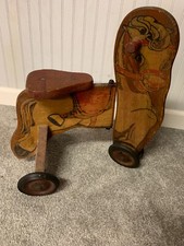 Vintage Wooden Horse on Wheels with Hinge to turn directions.