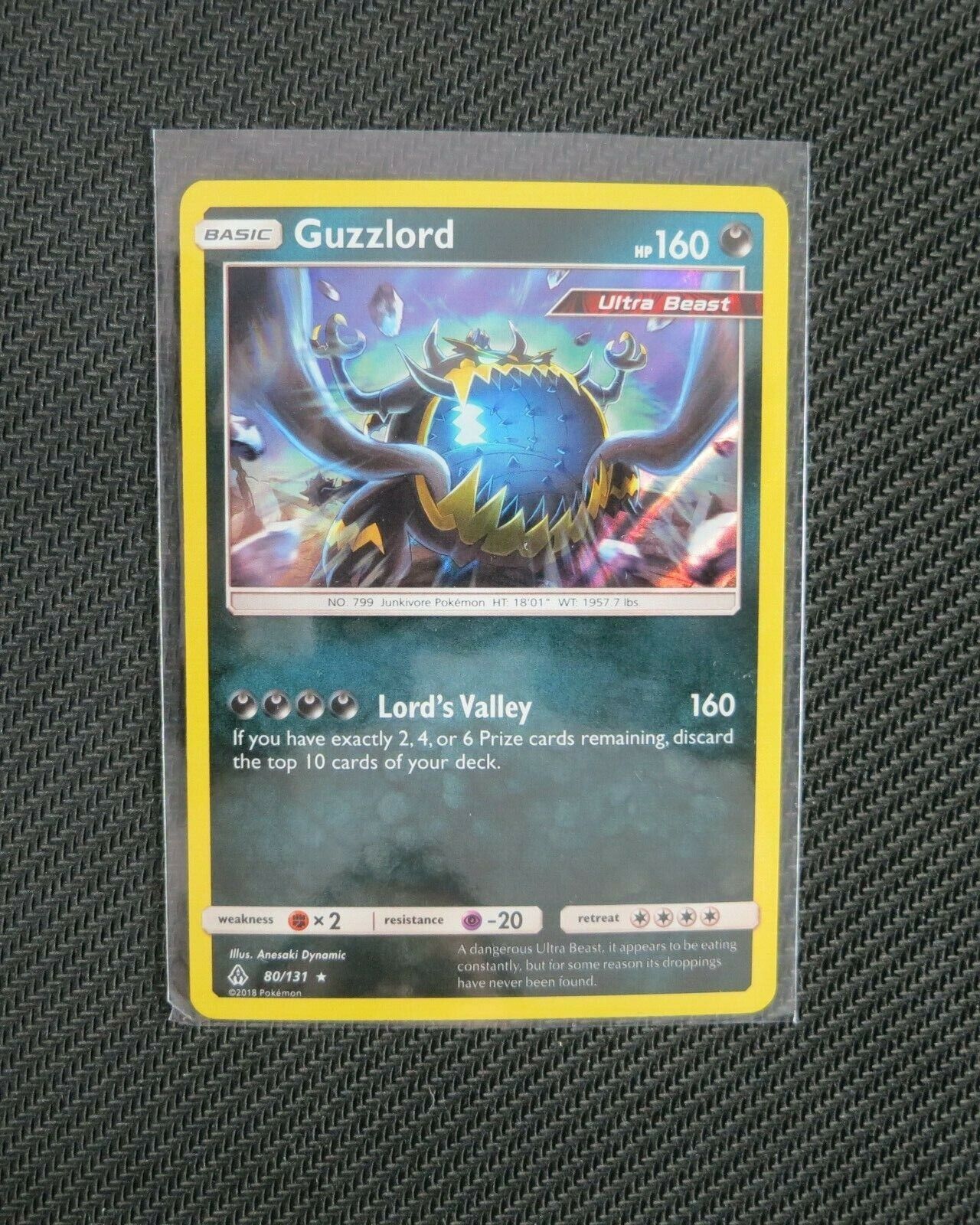 Mavin  Guzzlord Ultra Beast 80/131 HOLO Rare Pokemon SM Forbidden Light  TCG Card NM