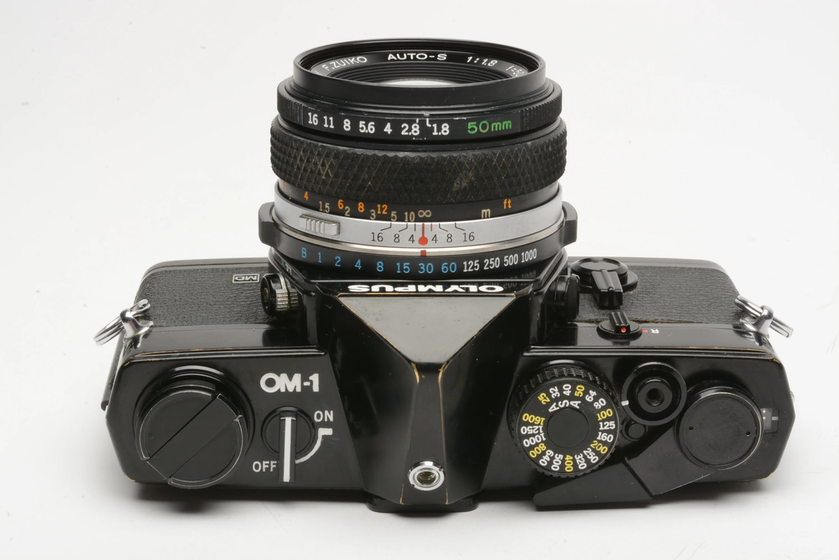 Olympus OM-1 MD black body w/50mm f1.8 Zuiko lens, New seals Olympus OM-1 MD black body w/50mm f1.8 Zuiko lens, New seals
