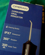 OPERAN CORDLESS ORAL IRRIGATOR--NEW IN BOX, 4 MODES