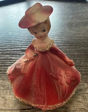 Vintage Red Enesco Southern Bell Figurine. Probably ceramic.