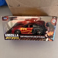 Jada 1/24 Godzilla 2002 Nissan Skyline GT-R R34 Diecast Car  - Box DMG