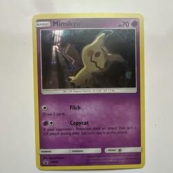 Mimikyu SM99 Sun & Moon Black Star Promo Holo