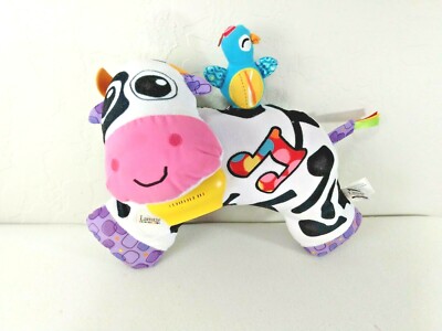 Lamaze Tomy Cow Chorus Baby Activity Toy Musical Soft Toy has batteries