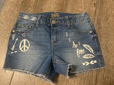 Justice sz 12 peace sign be free arrow blue jean shorts guc