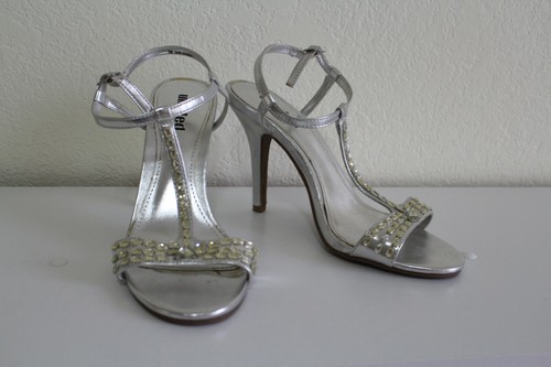 size 1 silver heels