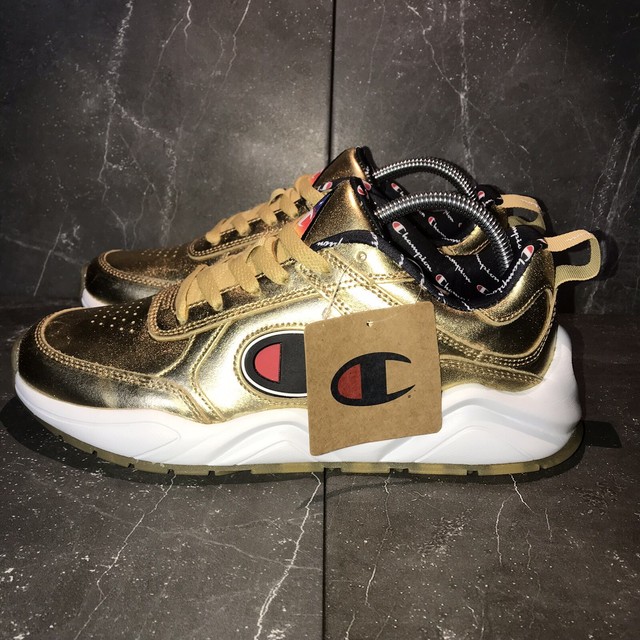 gold champion sneakers