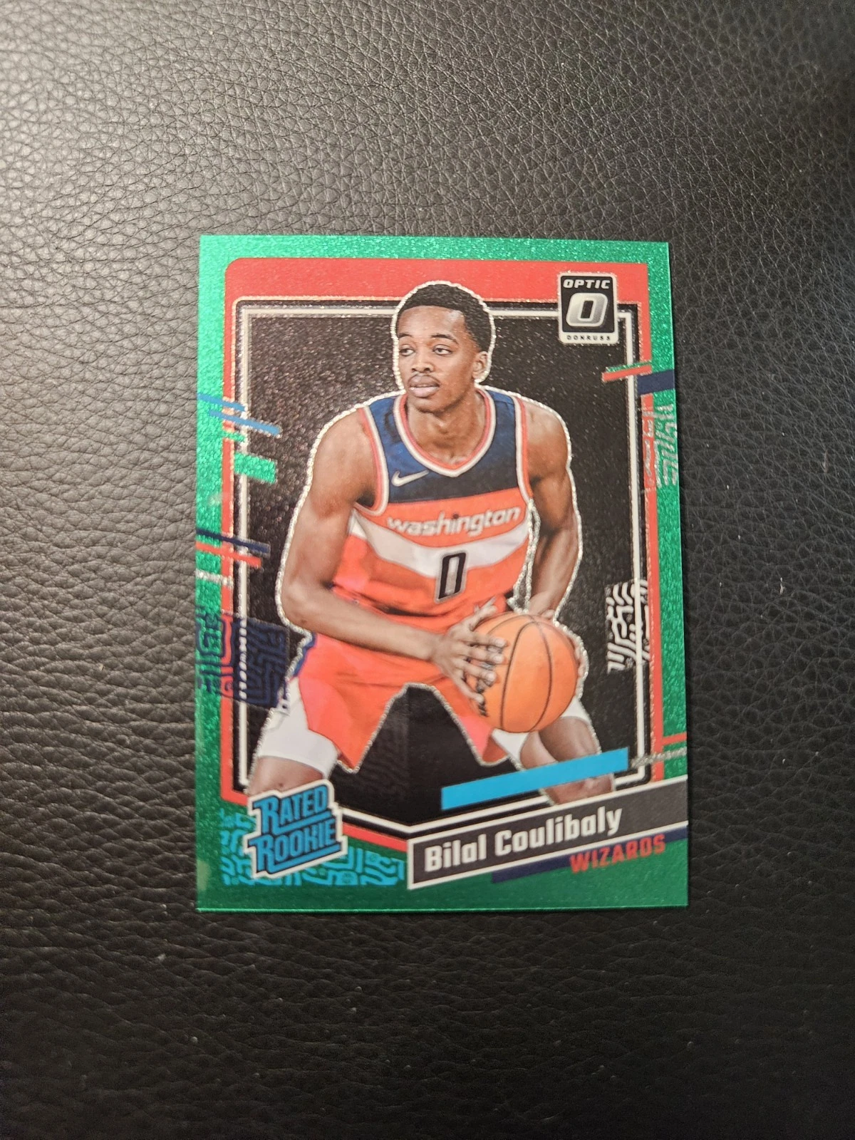 2023-24 Panini Donruss Optic Green Glitter Bilal Coulibaly /77 (RC)