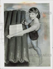 1956 Press Photo Nancy Hadley studying script in the pool at her apartment, CA