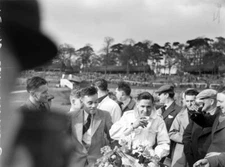 Percy Maclure, 1st position, has a drink after the race 1938 Racing Old Photo