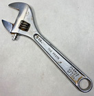 Chrome 6-inch adjustable crescent wrench with black handle, marked “706 PROD. FORGED ALLOY STEEL,” made in USA.