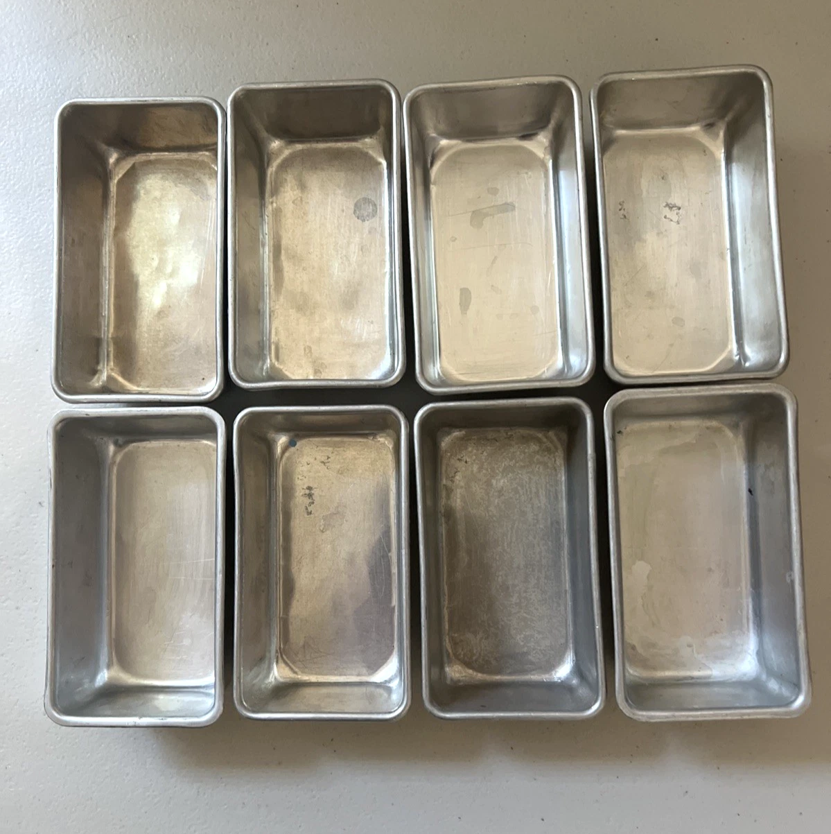 Vintage 8 ct Extra Small Individual Loaf Pans Aluminum 4.75" x 2.75" x 1.5"
Opens in a new window or