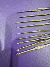 Lot of 9 Preowned Boye  Bates Metal Crochet Hooks Sizes 00 to 14