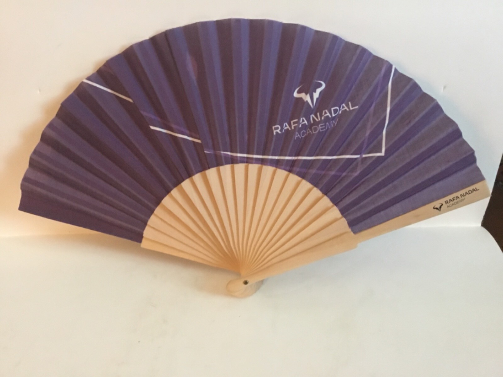 Rafa Nadal Academy Folding Blue Fan. Poly Fabric Wooden Slats. L 16.5” H 9”