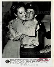 Press Photo Actress Dorothy Lamour greets US serviceman during War Bond drive.