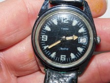 VINTAGE TIMEX ELECTRIC WATCH TIME/DATE GLOW DARK BLACK DIAL-NEEDS BATTERY/COVER