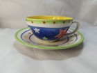 Whittard of Chelsea large cup and saucer, coloured stars