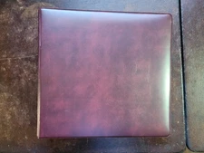 2 USED G & K BINDERS W/21 PLASTIC PAGES EACH. THREE 2-SIDED POCKETS PER PAGE.