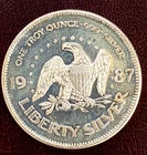 One-ounce Silver Liberty Round composed of .999 pure silver.