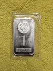 1 oz Silver Morgan Bar minted by the Highland Mint (HM).