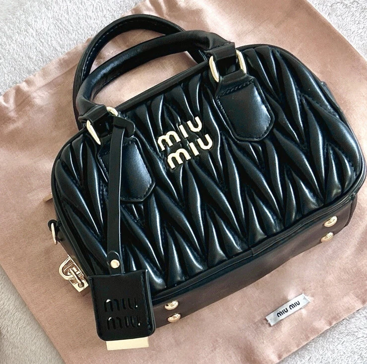Second hand miu miu best sale bags