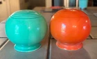 early vintage fiestaware salt and pepper spherical shakers radioactive orange