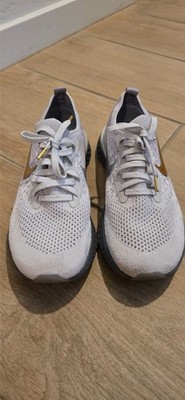 Womens Nike Epic React FL MET PRM size 7.5 grey/metallic gold slightly Used