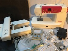 A Silver CH05AX / CH05 sewing machine with accessories (please read)