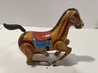 BUCKING BRONCO TIN LITHO WINDUP TOY IN ORIG BOX BY DAIYA   1950s   JAPAN WORKS — photo 1