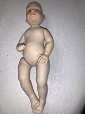 bisque doll 9 “ Needs Cloths and Hair- Blue Eyes