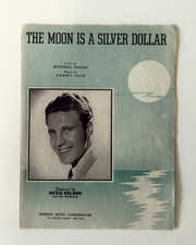 The Moon Is A Silver Dollar. Music by Sammy Fain. Featured by Ozzie Nelson