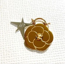 CHANEL Holiday 2025 GOLD CAMELLIA SILVER STAR CHARM KEYCHAIN PENDANT NEW