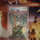 The Pokémon Company Meowth 106/094 Phantasmal Flames Holo Illustration Rare PSA…