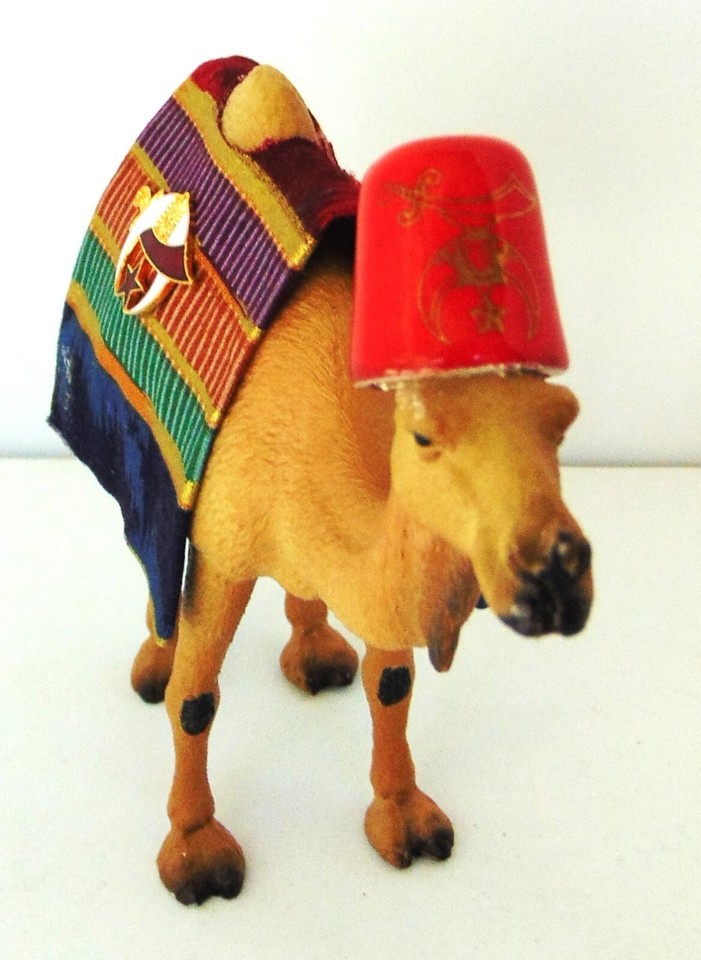 MASONIC SHRINER CAMEL,HAS FEZ, BLANKET, SHRINE EMBLEMS ON EACH SIDE