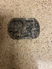 The American Farmer Feeds The World 1988 Belt Buckle