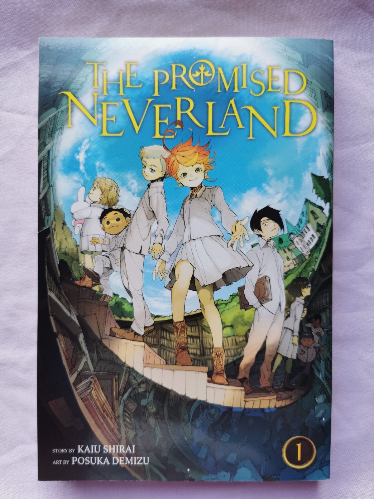 The Promised Neverland Volume 1 by Kaiu Shirai Paperback Manga