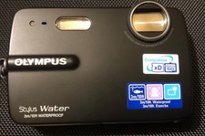 Olympus -550 Wp Water Compact Camera With Battery, Charger, And Case.