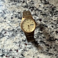 Vintage ELGIN quartz Day Date Watch In Gold Tone